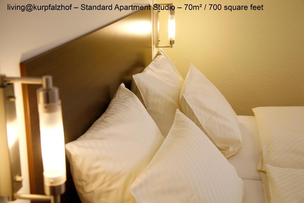 Serviced Apartments Kurpfalzhof Oftersheim Rum bild