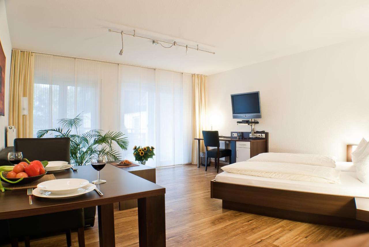 Serviced Apartments Kurpfalzhof Oftersheim Rum bild